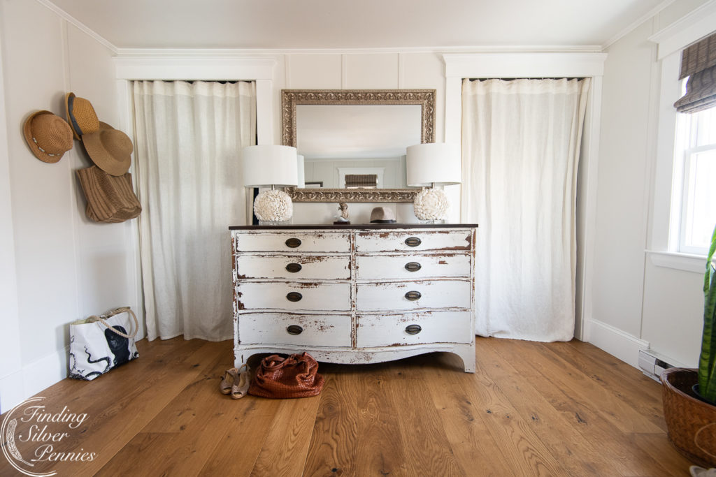 Wide plank floors make this bedroom feel so inviting. Learn how we care for our floors and if we'd recommend them for your home.